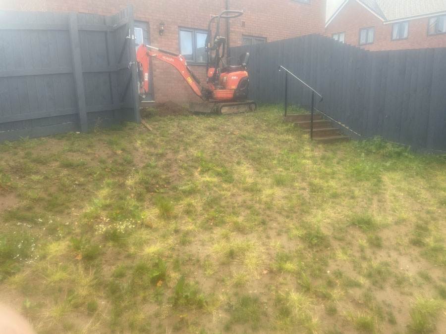 Garden with mini digger