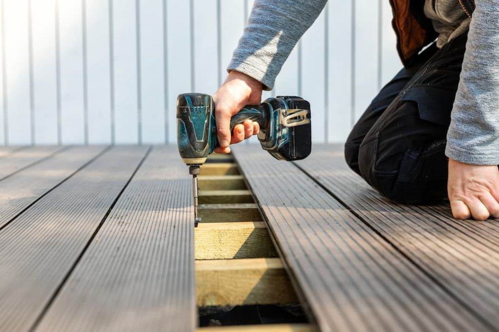 Person fitting decking